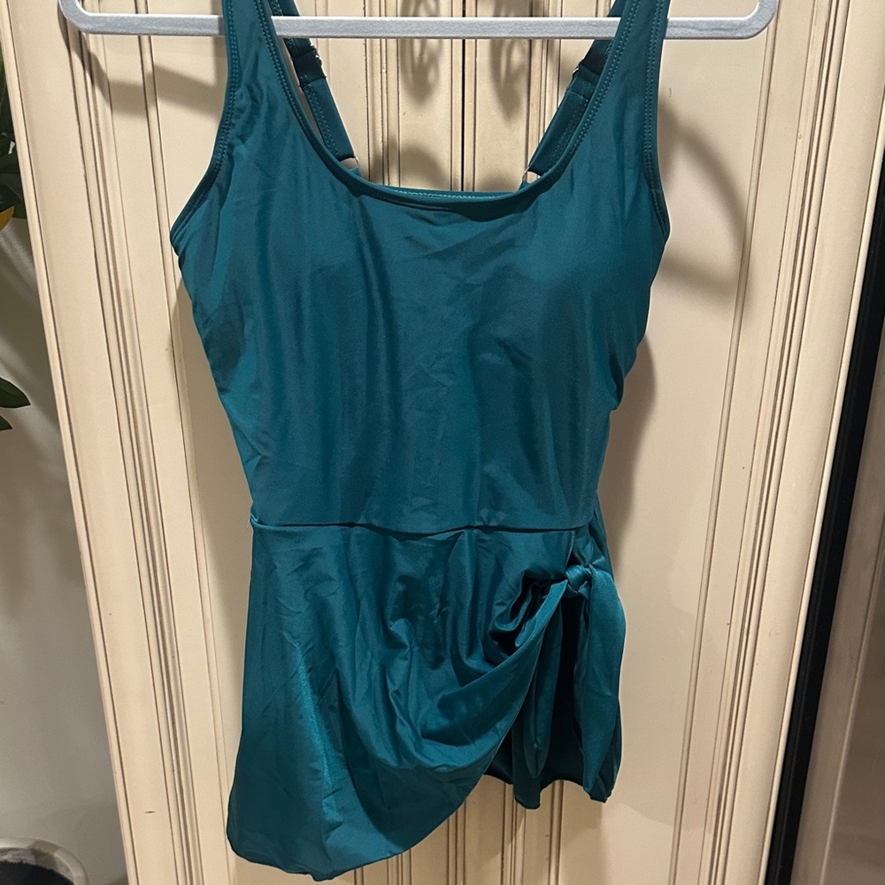 Swim suit with attached skirt